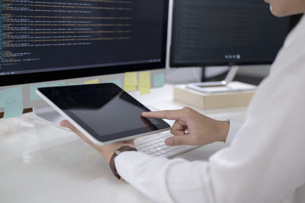 a doctor using a tablet