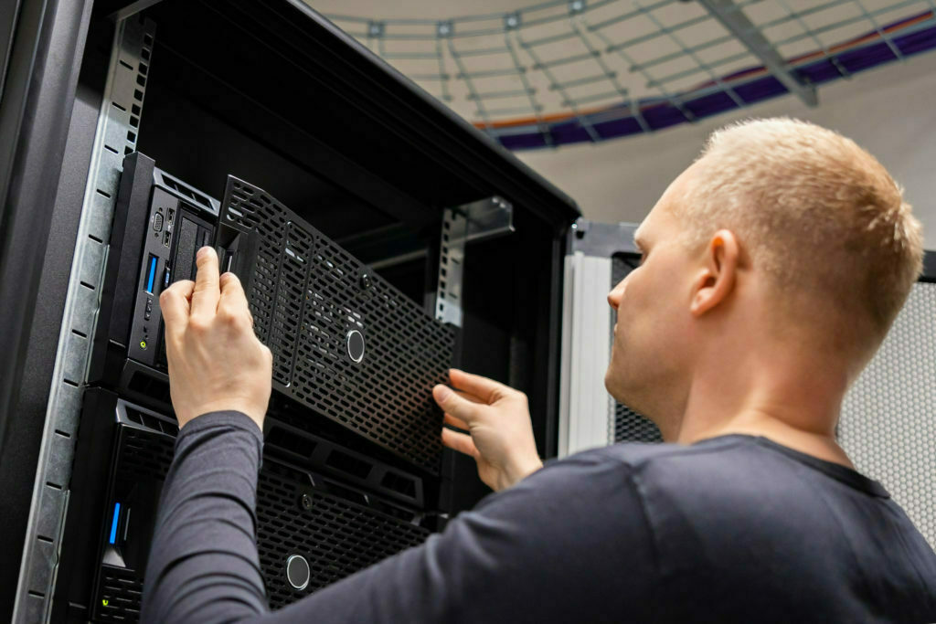 a man looking at a computer screen