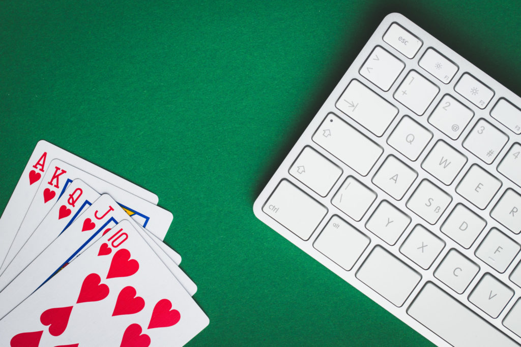 a white keyboard with red and blue letters on it