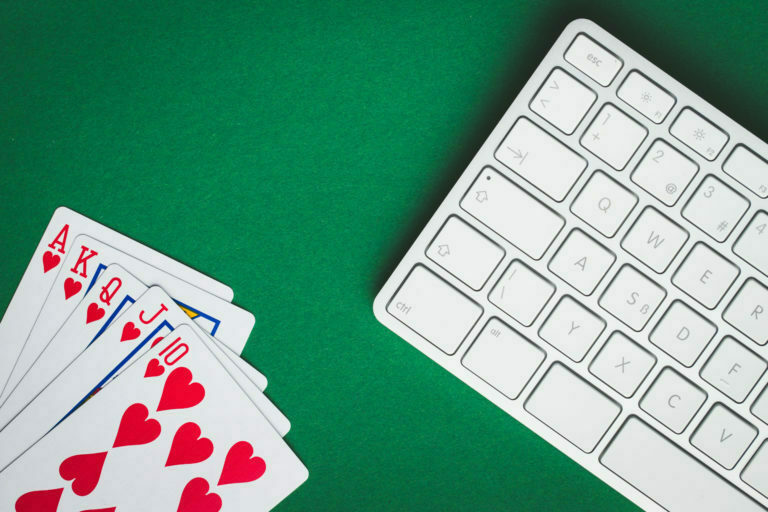 a white keyboard with red and blue letters on it