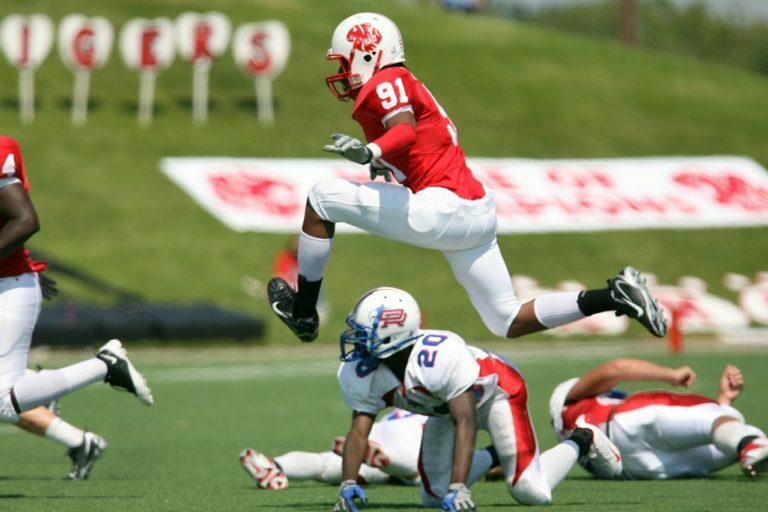 a football player running with the ball